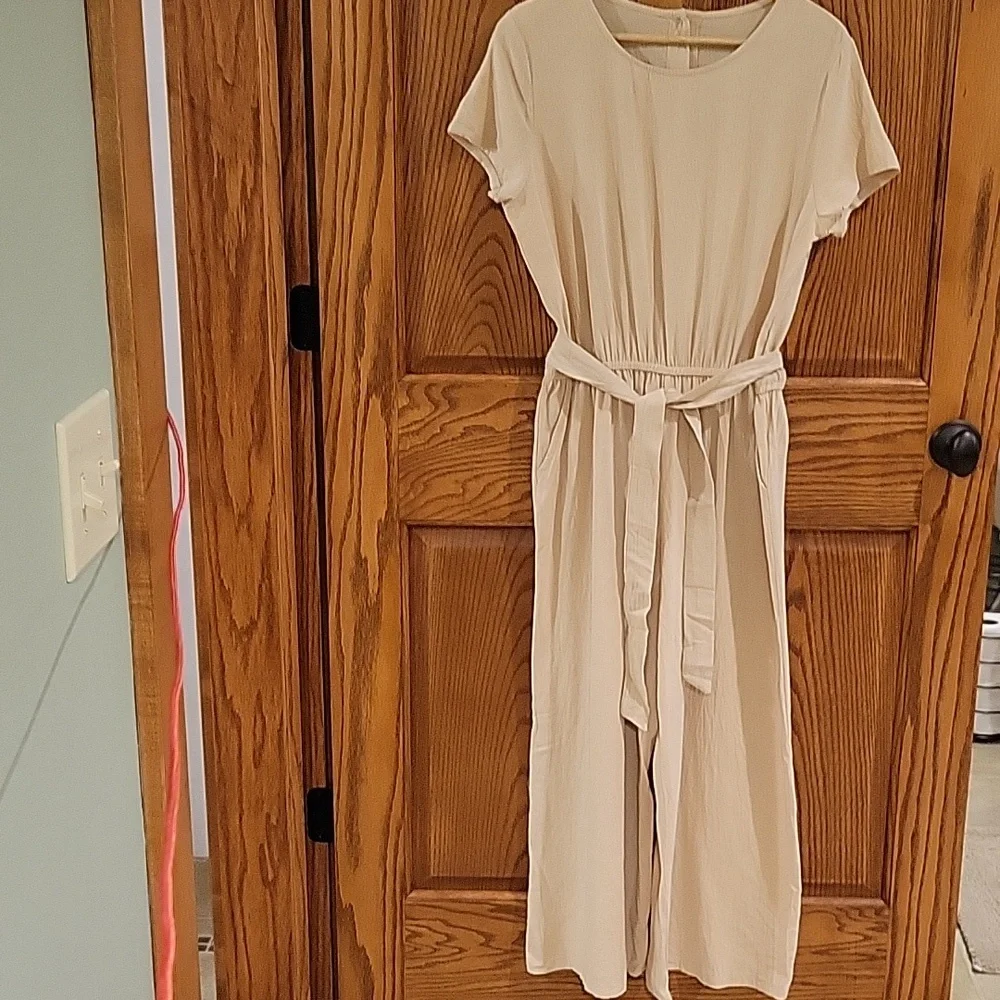 This is a womens linen jumpsuit in a tan color, size large. - Picture 1 of 4